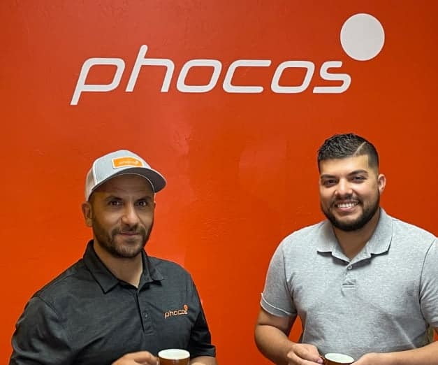 Phocos executives drinking coffee